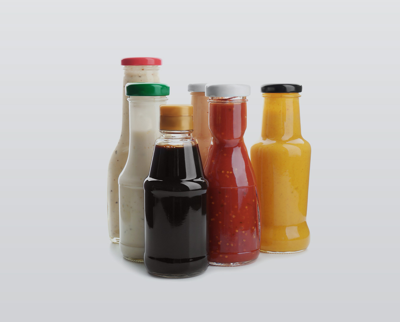 Selection of sauce condiment products.