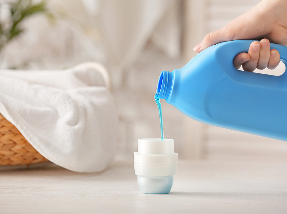 Liquid detergent in plastic bottle for which Rotzinger offers packaging solutions.